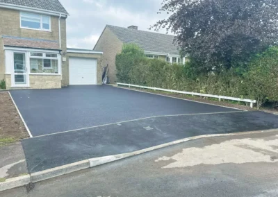 As we wrap up another successful year at Lawrence Contractors, we're proud to showcase our final projects that demonstrate our commitment to quality craftsmanship. Each driveway transformation reflects our dedication to enhancing local properties, improving accessibility, and creating lasting value for our customers. From precision drop kerb installations to expertly finished tarmac surfaces, these end-of-year projects represent the high standards we maintain across Axminster and surrounding areas. Here's a glimpse of how we've helped homeowners end their year with improved, practical, and visually appealing driveways.