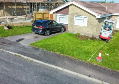 Axminster Devon New path Edging Kerbs and New Tarmac