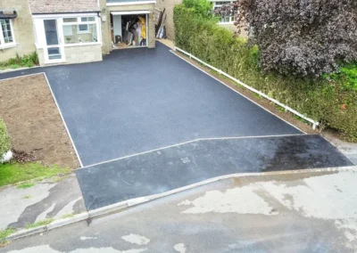 Axminster Devon New path Edging Kerbs and New Tarmac