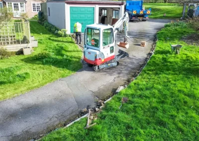 Axminster Removed old damaged edging kerbs