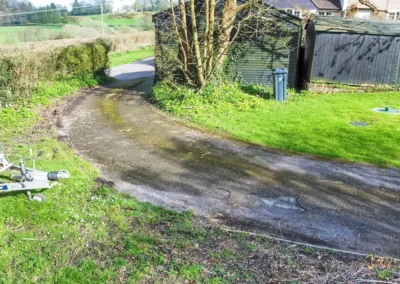 Axminster Removed old damaged edging kerbs