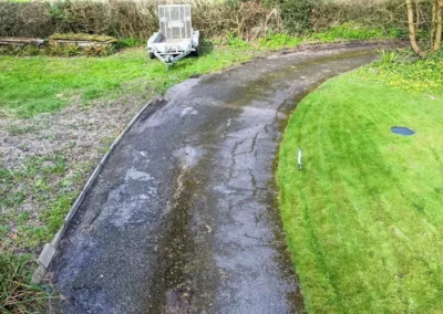 Axminster Removed old damaged edging kerbs
