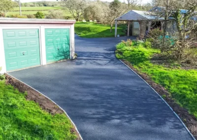 Axminster Removed old damaged edging kerbs