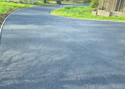 Axminster Removed old damaged edging kerbs