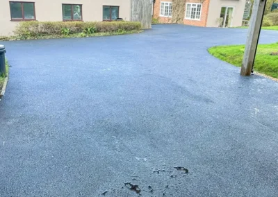 Axminster Removed old damaged edging kerbs