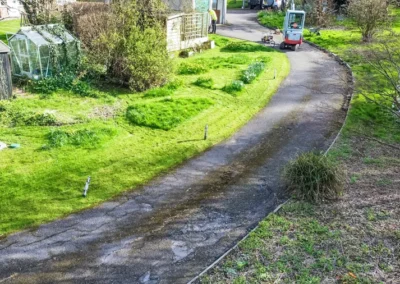 Axminster Removed old damaged edging kerbs